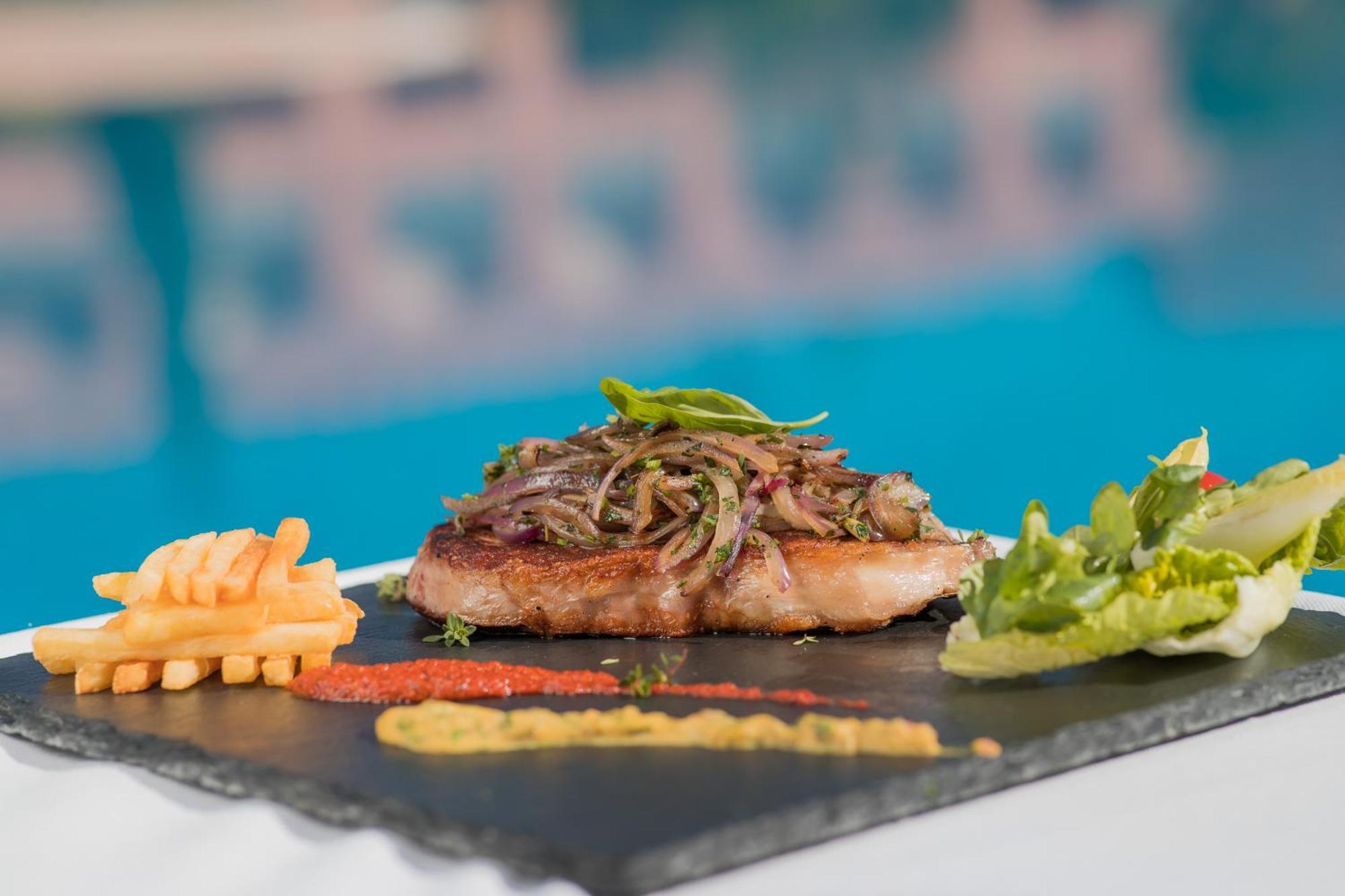 Grand Mogador Agdal & Spa Marrakesh Esterno foto A steak prepared with the method of cooking
