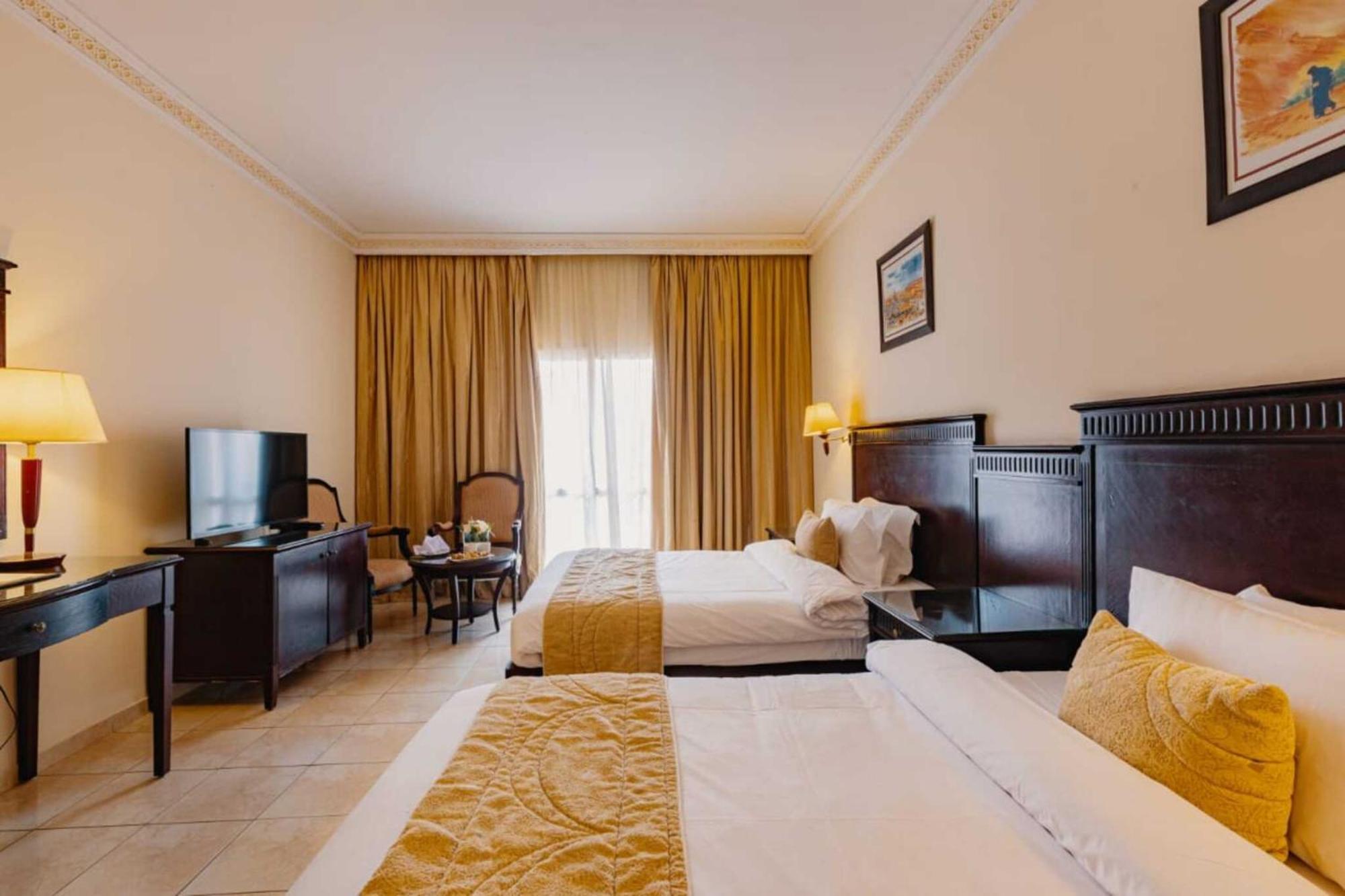 Grand Mogador Agdal & Spa Marrakesh Esterno foto A room at the hotel